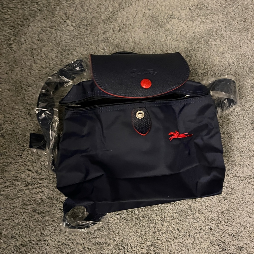 LONGCHAMP Mini Le Pliage Canvas Backpack in Navy with Red Trim
